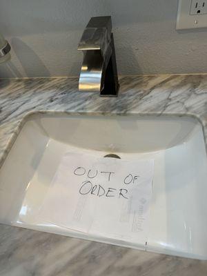 Bathroom faucet. I placed the out of order sign because I kept turning on the tap automatically out of habit. Drainco never followed up.