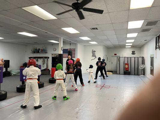 Sifu Alan Myrtle gives Instructions before the kids sparring class at Northwest martial arts.