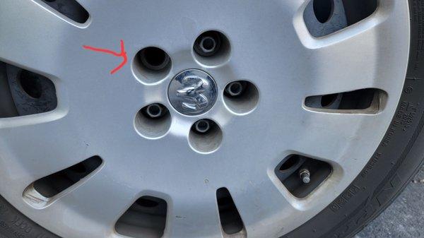 Missing lug nut bolt from them not properly being torqued down.