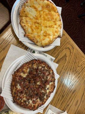 Garlic cheese pizza and meat pizza