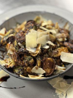 Pan roasted Brussel sprouts with balsamic glaze and shaved Parmesan