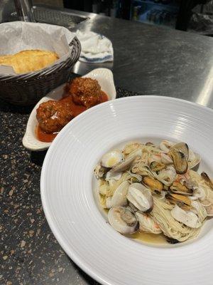 Mediterranean pasta with side of meatballs