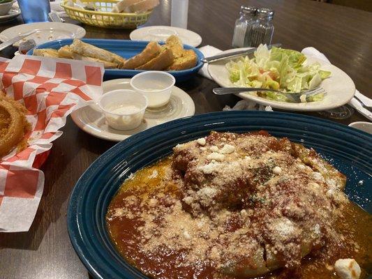 Stuffed peppers with side salad and garlic bread