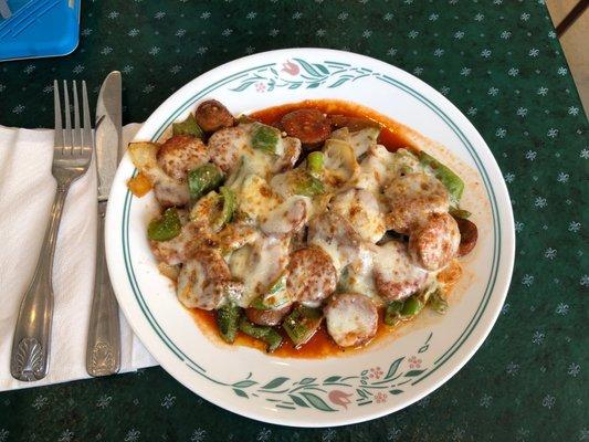 Sausage and peppers with a marinara and cheese on top!  Perfecto!!