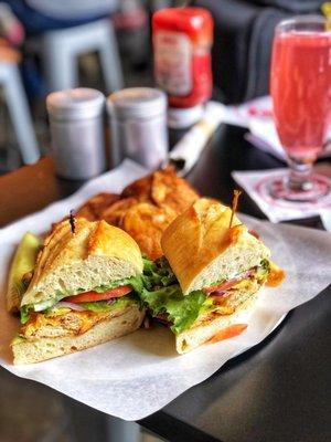 Turkey avocado sandwich with raspberry hard lemonade