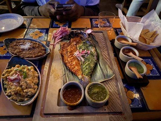 Refritos, Arroz con Queso, Branzino with extra Salsa Sampler and Chips