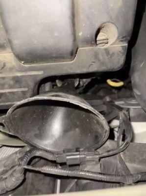 oil cap left in oil tank- photo sent from dealership