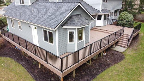 Awesome drone photos of our recent deck replacement! TimberTech AZEK Vintage Collection decking in English Walnut