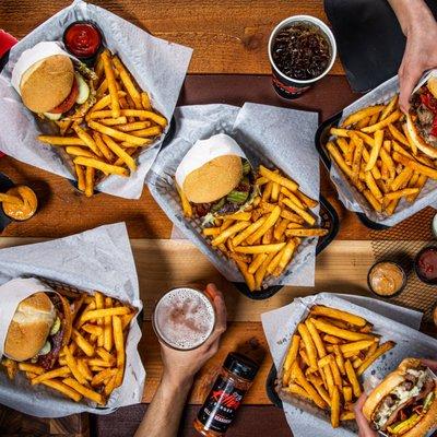 Burger, beers, and good times...and always served with bacon and fries.