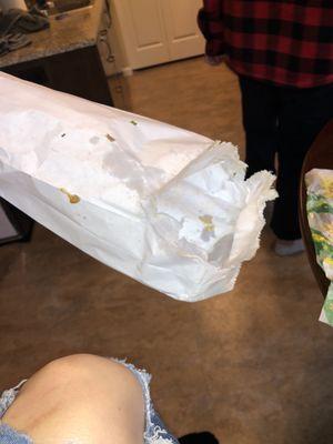 Bag was falling apart. It's not like subway is greasy. Due to improper sandwich making.