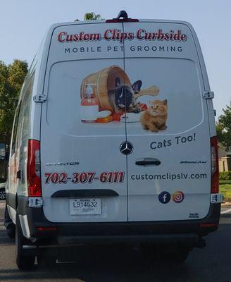 Custom Clips Pet Grooming's expired Indiana temporary tag (dated May 27, 2021) seen driving in Las Vegas on September 24, 2021