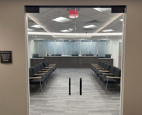 View of front door and waiting room