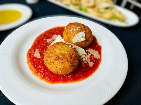 ARANCINI Hand-made, filled with mozzarella & risotto, served with house-made red sauce