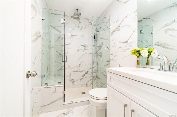 Condo for sale with updated bathroom.  What style do you like?