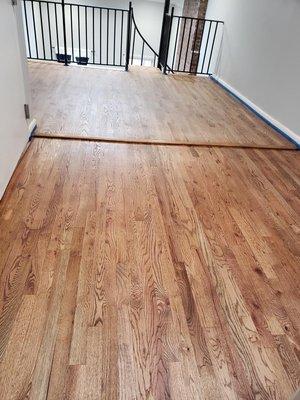 Continuation
 Sand, Stain (Color: DuraSeal- Special Walnut 124)
 Two coats of Bona Mega Clear-HD Water-born Satin Finish to 250 Sq. Ft.