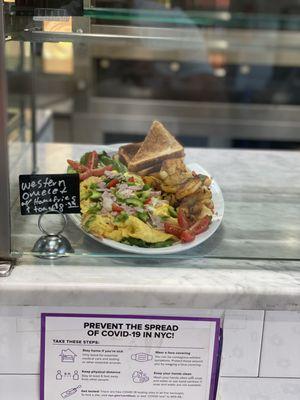 Western omelet w/ home fries and toast