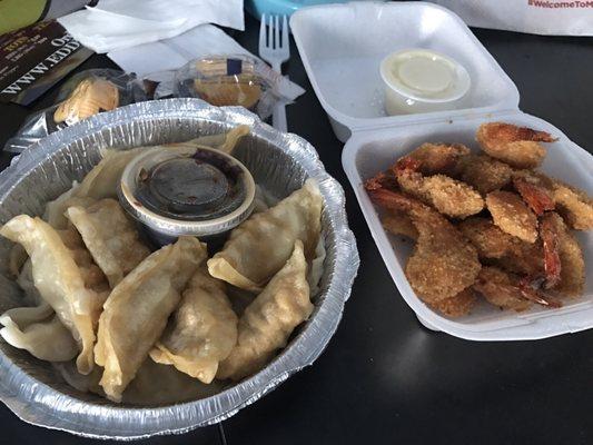 Delivery - took an hour (longer than usual) Fried shrimp comes w yummy coconut sauce And my usual half fried half steam dumplings