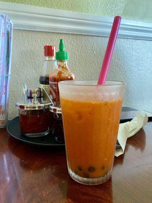 Thai tea with only a few boba in it