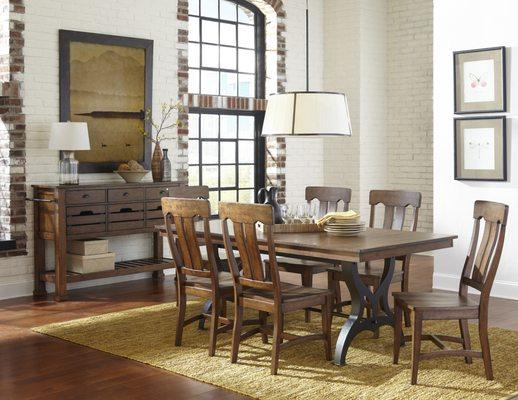 Popular Industrial styled birch extension table and chairs with metal base in this "District Collection"