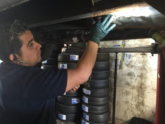 Alex is fixing a leaking gasoline tank.