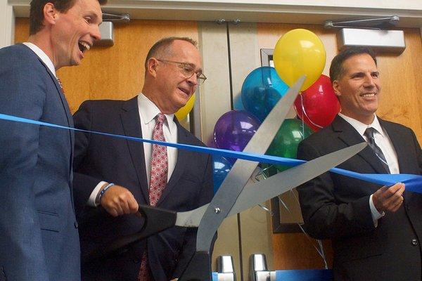 Mayor Tait cuts the ribbon at the Grand Reopening on October 25, 2016