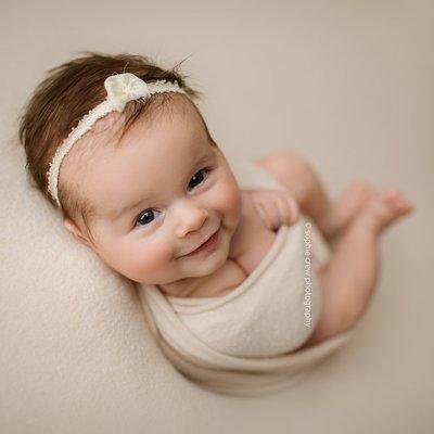 Smiles for older newborn baby photography