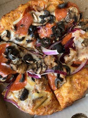 Pepperoni sausage olives fresh mushrooms and red onion