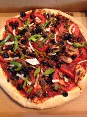 Veggie pizza without cheese makes it vegan.