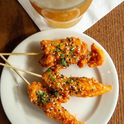 General Tso Chicken Skewers from Burtons Grill's Happy Hour Menu (available weekdays only, price and offering subject to chan...