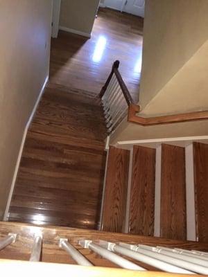 New staircase, red oak treads, posts & rails all stained to match Bruce Gunstock