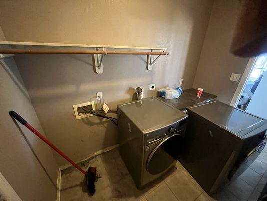 (Before) Dark and drab laundry room