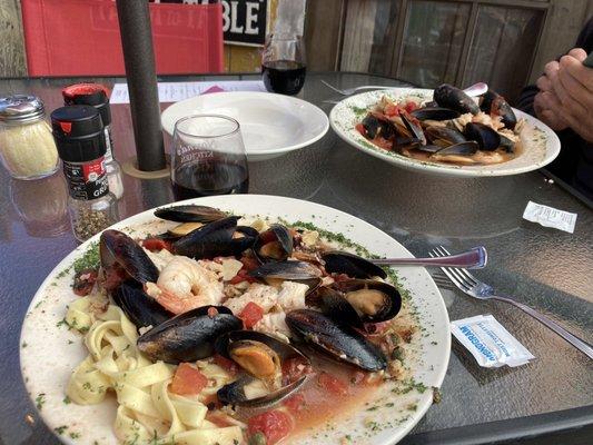 Seafood puttanesca and cioppino.