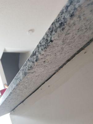 Underside of sitting area not polished and very dusty with powder.  Never got granite before so this maybe normal.