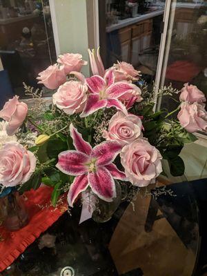 Arrangement of pink roses and stargazer lilies purchased on 12/12. Photo taken on 12/15. Still look & smell wonderful.