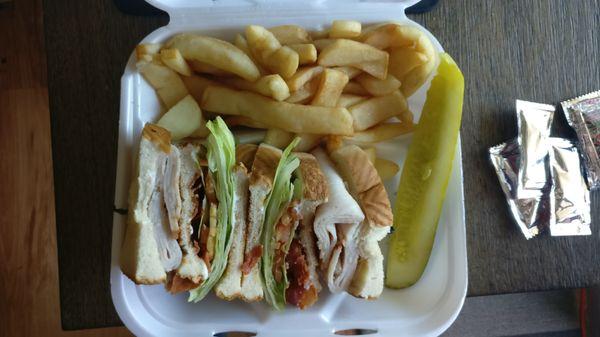 Turkey Club, with a side order of steak fries. $14 total.