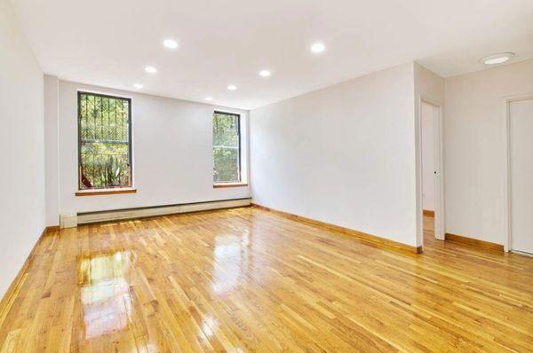 After: Living room updated and modernized with recessed lighting. It's never been this bright until now. The guys did an amazing job.