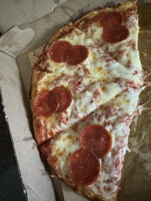 Pizza with very little pepperoni