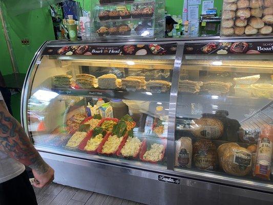 View of fresh meat and cold meat salads