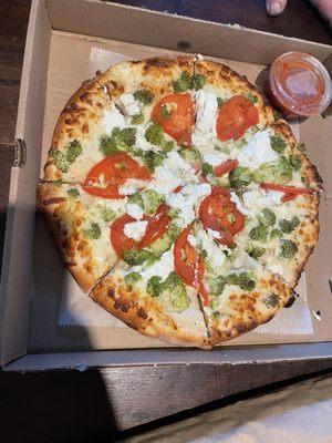 Broccoli, tomato and ricotta pizza