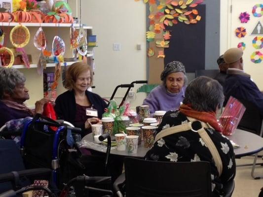 Seniors work on creative projects at our Adult Day Cares