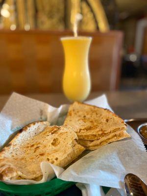 Peshawari Naan: sun-dried coconut , cashew, raisin and cardamon stuffed clay oven naan