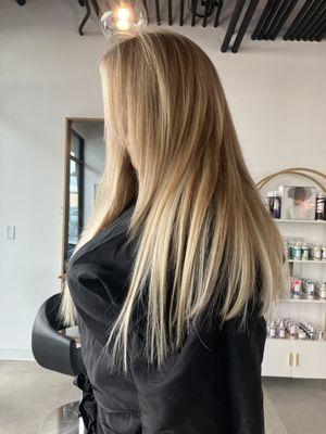 Blonding service with 22" extensions.