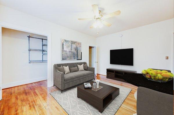 1818 Riggs Place Studio Apartments living area with day bed. Located in DuPont Circle DC