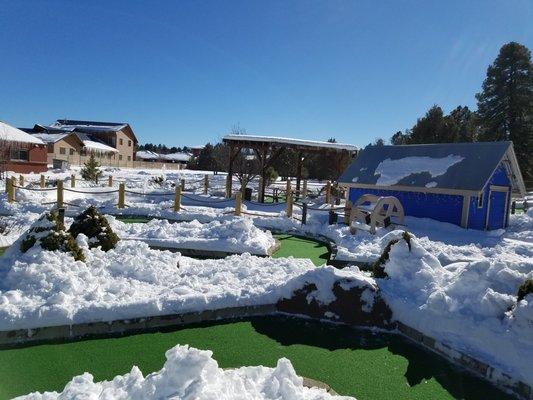 Playing in the snow on the mini golf course 2021.