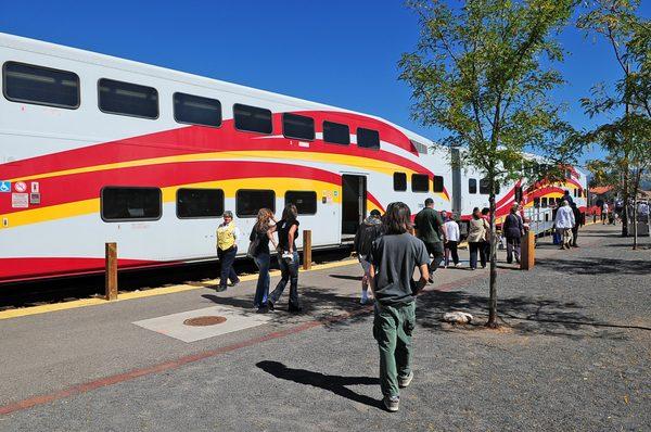 Passengers boarding the Rail Runner.