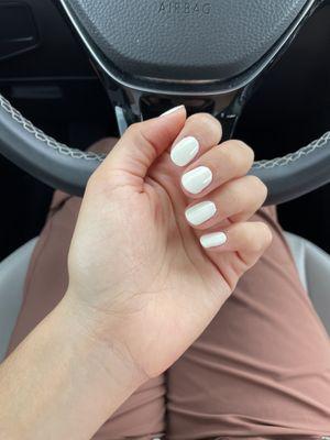 Beautiful manicure with OPI white color shade called "leave your coat on"