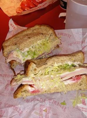 #11 Country Club with turkey breast, very lean smoked ham, lettuce,tomato, provolone, on 7 grain wheat bread