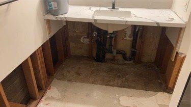 Leaky pipe forced the reconstruction of entire bathroom.