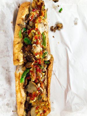 Cheesesteak Hoagie with grilled onions, green peppers and crushed hot peppers - $10