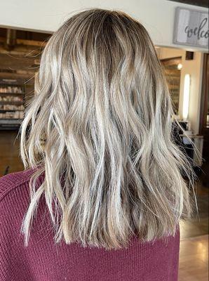 Balayage with added lowlights to make the grow out more seamless.